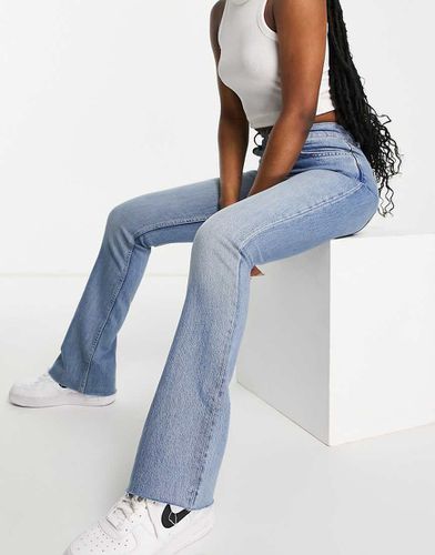 Jean stretch évasé taille haute style années 70 - Délavage clair - Asos Design - Modalova