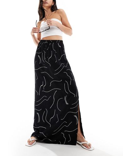Jupe longue nouée à la taille avec imprimé linéaire - Noir et blanc - Asos Design - Modalova