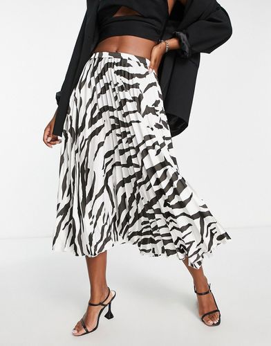 Jupe mi-longue plissée en satin à imprimé zèbre - Noir et blanc - Asos Design - Modalova