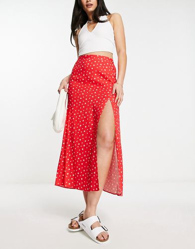 Jupe portefeuille mi-longue à détail boutonné et imprimé petites fleurs - Asos Design - Modalova