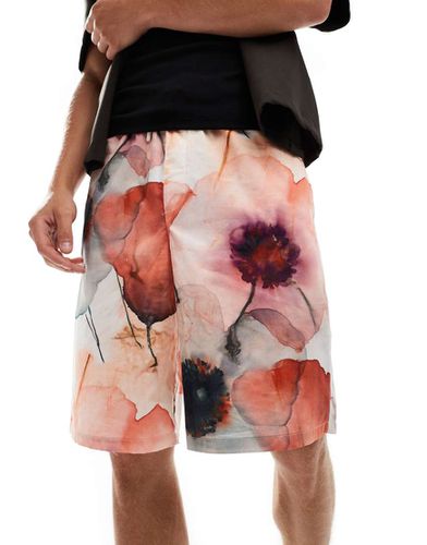 Short de course oversize à imprimé fleuri sur l'ensemble - Asos Design - Modalova