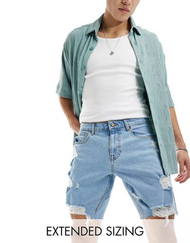 Short long en jean avec déchirures - clair délavé - Asos Design - Modalova