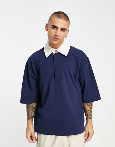 Sweat ultra oversize à manches courtes et col polo - Bleu foncé - Asos Design - Modalova