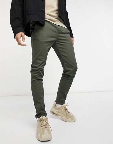 Pantalon chino ajusté - Kaki - Asos Design - Modalova