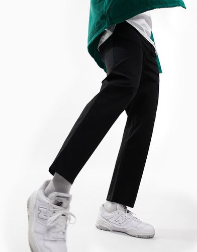 Pantalon chino décontracté style skateur - Asos Design - Modalova