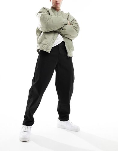 Pantalon chino fuselé oversize - Asos Design - Modalova