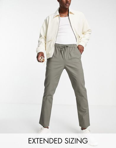 Pantalon chino slim à taille élastique - Kaki - Asos Design - Modalova