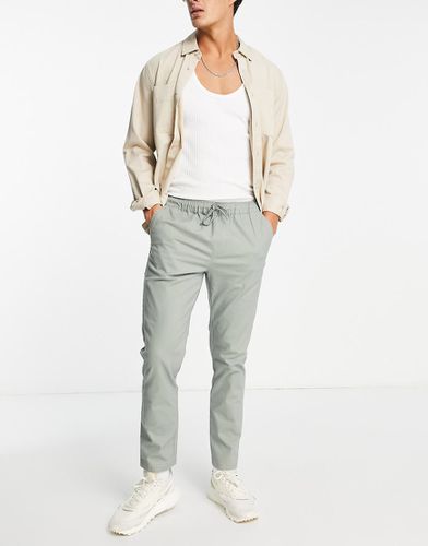 Pantalon chino slim avec taille élastique - clair - Asos Design - Modalova