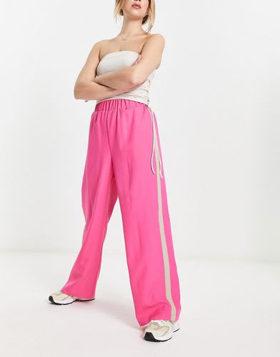 Pantalon à taille élastique et bande latérale taupe - Asos Design - Modalova