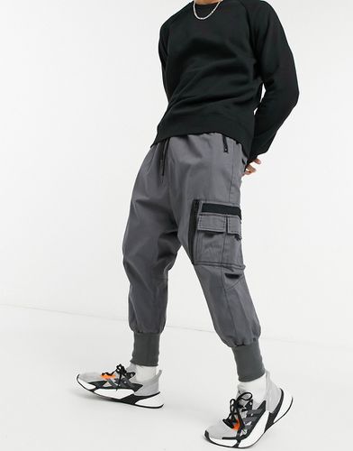 Pantalon à entrejambe bas avec poche MA1 et bordures en jersey - Asos Design - Modalova