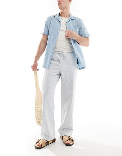 Pantalon ample à rayures en crépon avec taille élastique - Bleu et blanc - Asos Design - Modalova