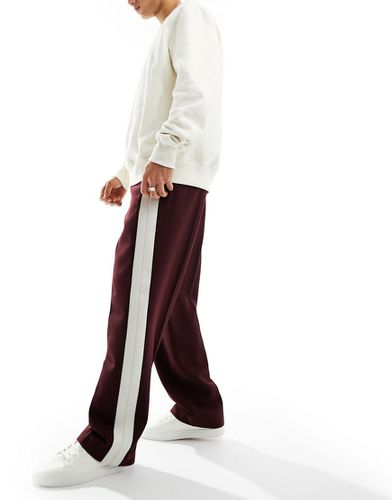 Pantalon ample en laine mélangée coupe habillée avec bande latérale - Bordeaux sergé - Asos Design - Modalova