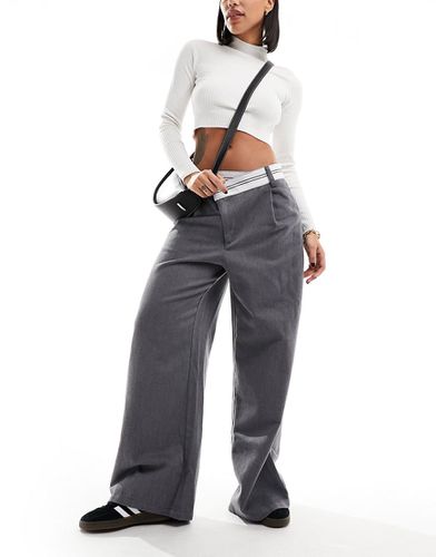 Pantalon asymétrique avec taille rabattue - Asos Design - Modalova
