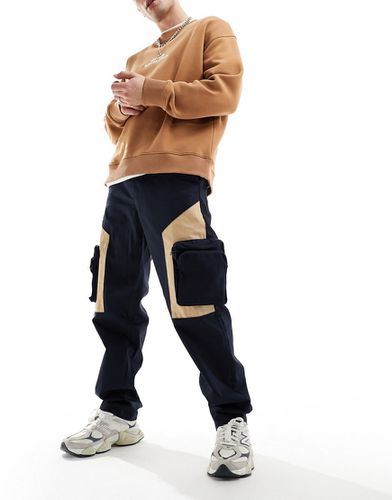 Pantalon baggy avec poches oversize contrastantes - Asos Design - Modalova