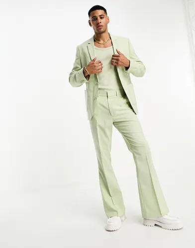 Pantalon de costume évasé - pâle - Asos Design - Modalova