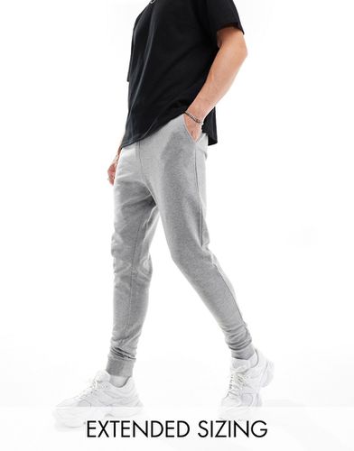 Pantalon de jogging ajusté - chiné - Asos Design - Modalova