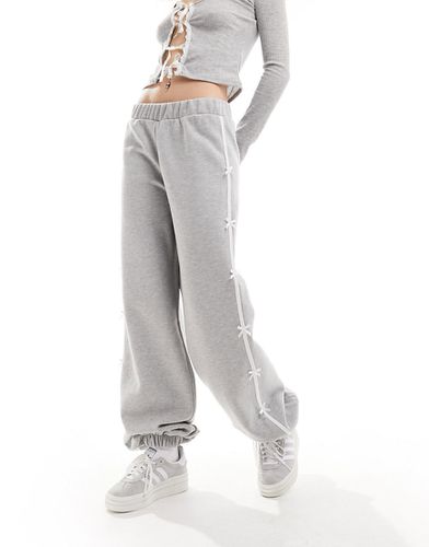 Pantalon de jogging avec bande latérale à nauds - chiné - Asos Design - Modalova
