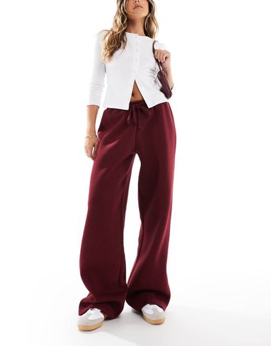 Pantalon de jogging brossé sur l'envers - Bordeaux - Asos Design - Modalova