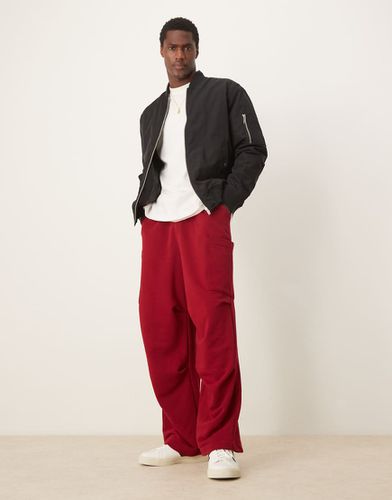 Pantalon de jogging cargo bouffant et oversize - Asos Design - Modalova