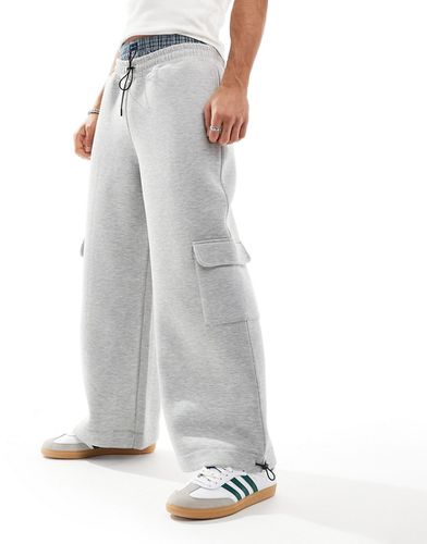 Pantalon de jogging cargo en néoprène à poches fonctionnelles - chiné - Asos Design - Modalova