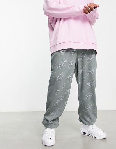 Pantalon de jogging d'ensemble oversize avec logo imprimé sur l'ensemble - Asos Design - Modalova