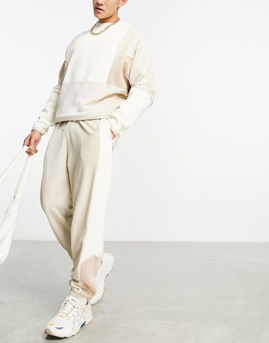 Pantalon de jogging d'ensemble oversize effet color block - Beige - Asos Design - Modalova