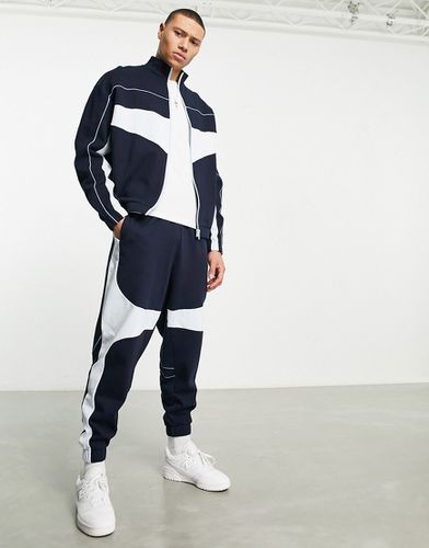 Pantalon de jogging d'ensemble oversize effet color block - Asos Design - Modalova
