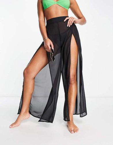 Pantalon de plage large transparent fendu sur le devant - Asos Design - Modalova