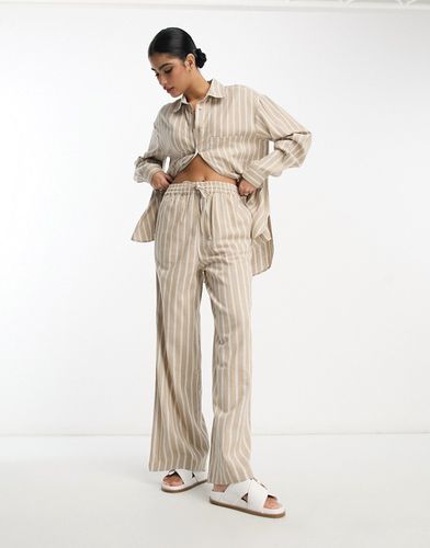 Pantalon d'ensemble à enfiler en lin rayé - Asos Design - Modalova