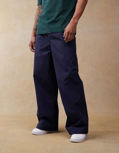 Pantalon d'ensemble super baggy  enfiler en nylon - Asos Design - Modalova