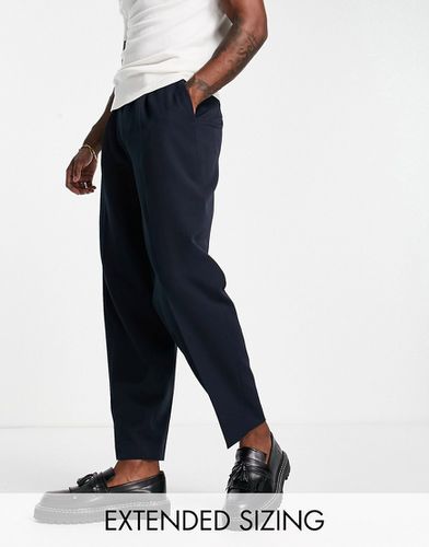 Pantalon habillé oversize coupe fuselée - Asos Design - Modalova