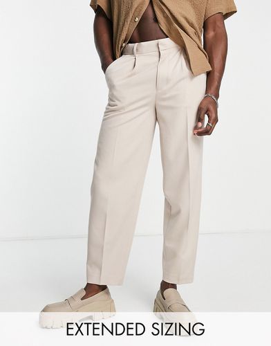 Pantalon habillé oversize coupe fuselée - Taupe - Asos Design - Modalova