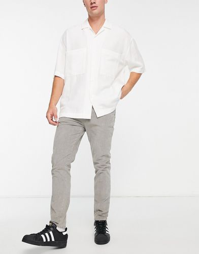 Pantalon skinny en velours côtelé - Anthracite délavé - Asos Design - Modalova