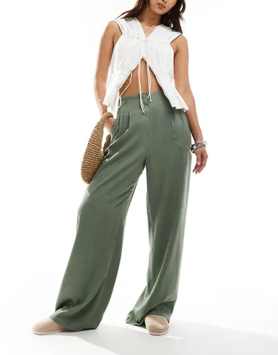 Pantalon taille haute à pinces en lin mélangé - Kaki - Asos Design - Modalova