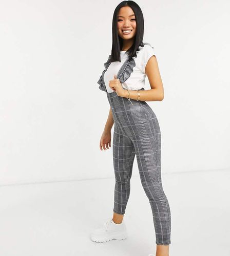 ASOS DESIGN Petite - Salopette moulante à bretelles volantées et motif à carreaux - Noir et blanc - ASOS Petite - Modalova