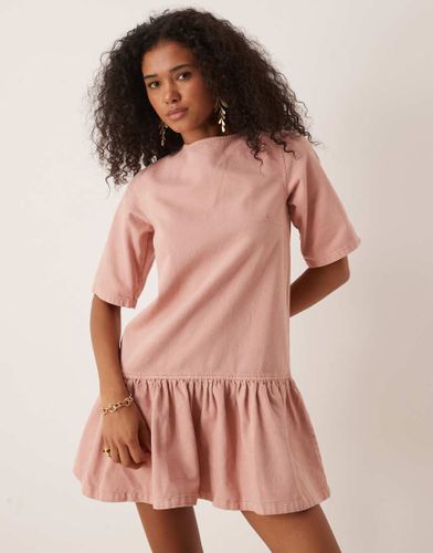 Robe t-shirt courte en denim avec taille basse - Rose - Asos Design - Modalova