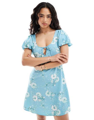 Robe courte à fleurs avec manches bouffantes - Asos Design - Modalova