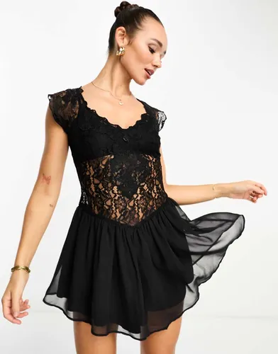 Robe courte en dentelle variée - Asos Design - Modalova