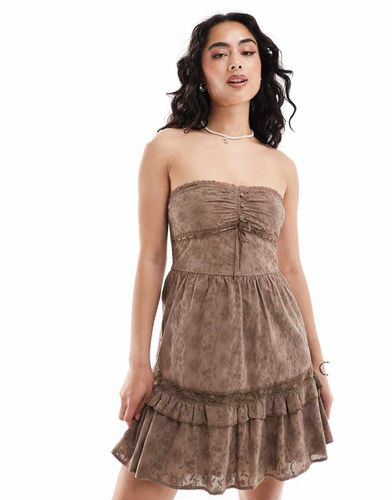 Robe d'été bandeau en broderie anglaise de qualité supérieure boutonnée devant style corset - chocolat - Asos Design - Modalova