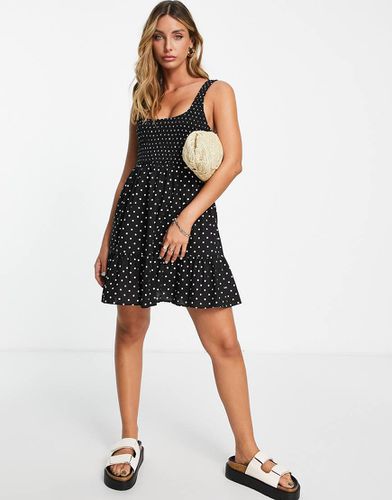 Robe d'été courte à pois avec fronces et volants - Noir et blanc - Asos Design - Modalova