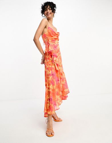Robe nuisette mi-longue nouée sur le côté avec col bénitier, ourlet asymétrique et volants - Orange à imprimé fleurs - Asos Design - Modalova