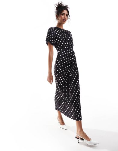 Robe plissée mi-longue à manches courtes et jupe torsadée - Ivoire à pois - Asos Design - Modalova