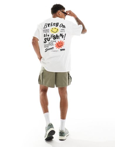 T-shirt oversize à imprimé soleil souriant au dos - Asos Design - Modalova