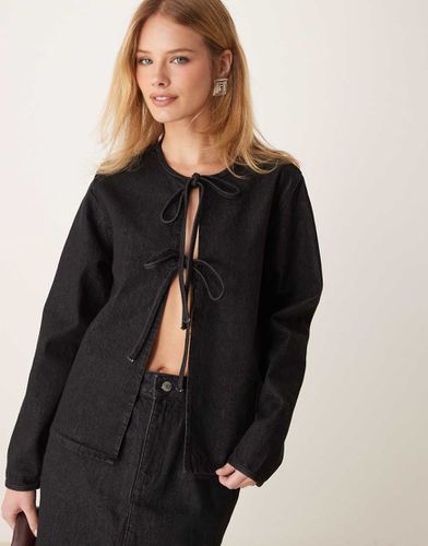 Top manches longues en jean noué devant - Noir délavé - Asos Design - Modalova