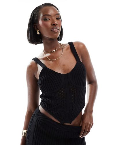 Top corset d'ensemble en maille crochetée - Asos Design - Modalova