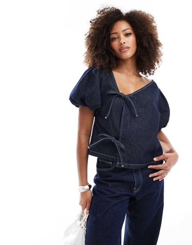 Top en jean asymétrique noué sur le côté - moyen - Asos Design - Modalova