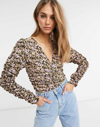 Top froncé à manches longues et imprimé fleuri - Asos Design - Modalova