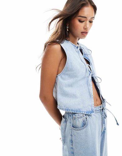 Veston coupe carrée en denim délavé avec liens noués à l'avant - Asos Design - Modalova