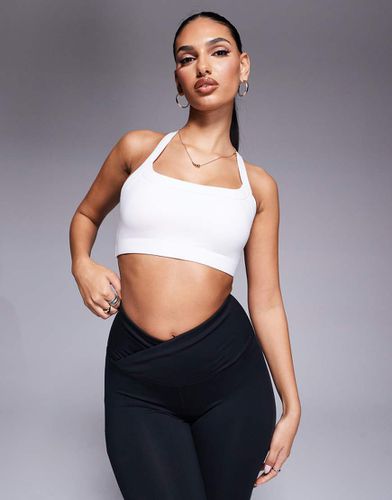 Brassière de sport maintien intermédiaire en tissu doux avec bretelles ajustables croisées dans le dos - Asos 4505 - Modalova