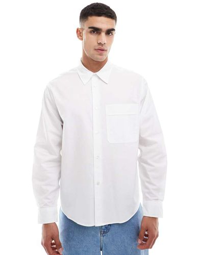 Chemise coupe carrée à manches longues - Bershka - Modalova